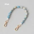 Primo piano della catena di perle acriliche marmorizzate blu e crema da 37 cm con ganci - Stile 4 (Cod 20260706)