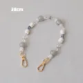 Close-up of 38cm decorative acrylic bead strap with grey glitter beads and gold clasps - 38cm / Silver Gray