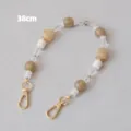 Detailed view of a 38cm beaded resin chain strap featuring gold-tone lobster clasps - 38cm / Apricot
