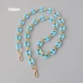 Gedetailleerd beeld van de 120 cm matblauwe acryl en gouden varkensneus ketting - 120cm / Blauw