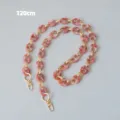 Detailed view of 120cm vintage marble pink resin pig nose chain strap for luxury bags - 120cm / Red