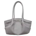 Sophisticated grey pebbled leather cloud bag featuring a unique pleated design for stylish women. - Gray
