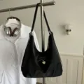 Versatile black large capacity hobo bag featuring bow detail and a heart pendant charm - Black Without Pendant