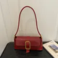 Red crocodile pattern baguette shoulder bag with gold rectangular buckle. - Red