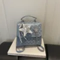 Light blue polka dot women's backpack with a stylish silver star charm in Korean style - Blue with Charm