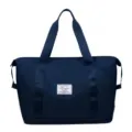 Spacious navy blue travel duffel bag with durable handles for weekend trips and gym - Dark Blue