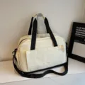 Large capacity travel duffel bag in beige, perfect for short business trips, gym, and sports. - Off White