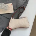 Trendy woven straw underarm shoulder bag in cream color for summer beach fashion - Style 1 / Brown