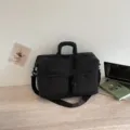 Black multi-pocket travel duffel bag, casual business trip luggage and lightweight fitness storage bag. - Black
