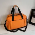 Orange travel duffel bag large capacity gym sports luggage bag for short trips and fitness. - Orange