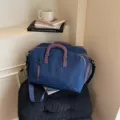 Travel duffel bag with shoe compartment, large capacity waterproof weekender bag for short trips. - Blue