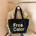 Casual black canvas tote bag with colorful letters embroidery, simple and stylish daily handbag. - No Pendant / Black