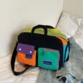 Sac de voyage colorblock, fourre-tout léger et imperméable pour week-end et sport. - Noir