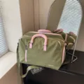 Olive green short trip duffel bag with pink handles, large capacity travel luggage bag. - Green