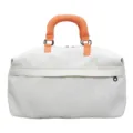 White canvas travel duffel bag with orange padded handle for short trips and gym fitness use - Off White