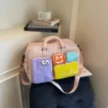 Bolsa de viaje colorblock rosa con múltiples bolsillos bonitos para almacenamiento diario. - Rosa