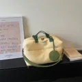 Beige travel duffel bag with green straps, large capacity lightweight overnight weekender bag. - Style 2 / Yellow