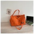 Large capacity orange travel duffel bag with shoulder strap, lightweight gym fitness storage bag. - Orange