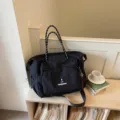 Black minimalist travel bag, large capacity canvas gym duffel for short trips and daily use. - With Pendant / Black