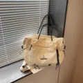 Minimalist Japanese style beige travel bag large capacity casual canvas tote bag for sports. - With Pendant / Off White