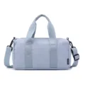 Lightweight water-resistant sports gym duffel bag in light blue for casual fitness travel. - Blue