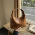 Retro brown oil wax leather hobo handbag with embossed maison lettering for women - Brown