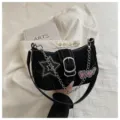 Black Y2K star baguette underarm bag featuring silver chain strap and unique OMG patch - Black