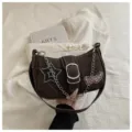 Stylish brown Y2K underarm bag featuring a metal chain, belt buckle, and star patch - Brown
