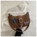 Y2K millennial style brown baguette shoulder bag with chain and star patch detail - Brown