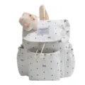 White drawstring backpack with black polka dots, bow patterns and plush star charm. - No Pendant / White