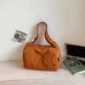 Minimalist orange travel duffel bag with large capacity, casual and lightweight for use. - Orange