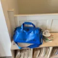 Blue gym duffel bag with strap, sports training bag and travel luggage for fitness. - Blue