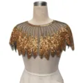 Detailed view of a vintage gold sequin cape bolero on mesh base for evening gowns - Radial Sequin Style (801) / Black & Gold