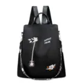 Black anti-theft backpack featuring delicate floral embroidery and adjustable straps - Black