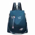 Navy blue Oxford cloth anti-theft backpack with exquisite floral embroidery and strap - Blue