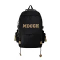 Sac à dos noir classique de grande capacité avec un patch lettre MDCGH en détail - Noir