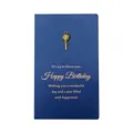 Elegant navy blue birthday card featuring a vintage gold metal charm and gold foil text - Lollipop / Dark Blue