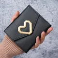 Trendy minimalist black leather coin purse with a geometric gold heart buckle card holder - Black