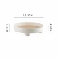 Witte ronde opbergbak met houten basis en korte pootjes, stijlvolle thuisdecoratie variant. - Witte opbergtrays