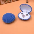 Blauw fluwelen schelp sieradendoosje met ring en ketting sleuven draagbare opbergdoos. - Blauw