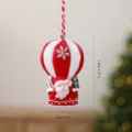 Resin Santa Claus hot air balloon Christmas ornament with height and weight specs - Hot Air Balloon Santa