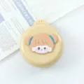 Mini folding hairbrush with cute cartoon girl design and built-in mirror, yellow variant. - Bun Girl