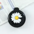 Portable foldable mini hair brush with mirror, cute black daisy cushion comb for travel. - Daisy