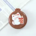 Portable mini folding air cushion hair comb with mirror, cute cartoon cat design for travel. - Cat