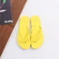 Solid color casual couple flip flops summer beach sandals yellow flat shoes for men and women - Rhubarb