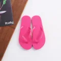 Solid color pink flip-flops for summer beach wear, comfortable flat design, slip-resistant sole. - Rose Red
