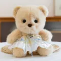 Cute plush bear toy with a white princess dress and heart pendant for girl birthday gifts. - Princess Dress Style / Beige