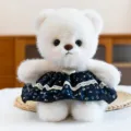 Cute white plush bear toy with dark blue floral princess dress and heart pendant for girls. - Floral Skirt Style / White