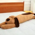 Long plush dog pillow, cute sleeping puppy stuffed toy for bed and home decor. - 70 cm / Brown