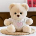 Cute plush teddy bear toy with white knitted sweater and pink heart, perfect birthday gift. - Embroidered Heart Style / Beige